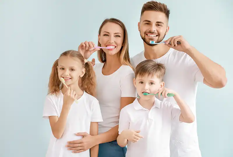 Family dentist greeting a patient during a routine general dentistry visit at Village Dental in North Raleigh, NC