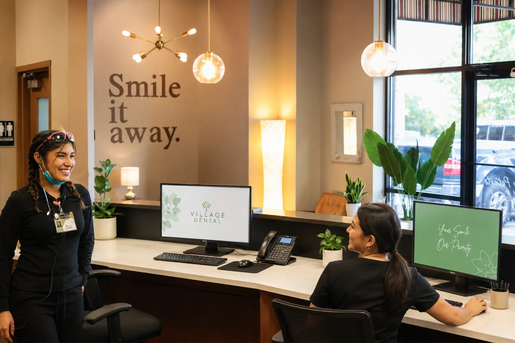 Welcoming front desk and reception at Village Dental Wake Forest on Capital Blvd in Wake Forest, NC