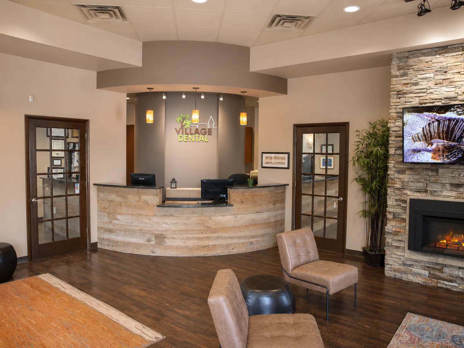 Village Dental — North Raleigh dental team welcoming a patient in the Six Forks Rd office