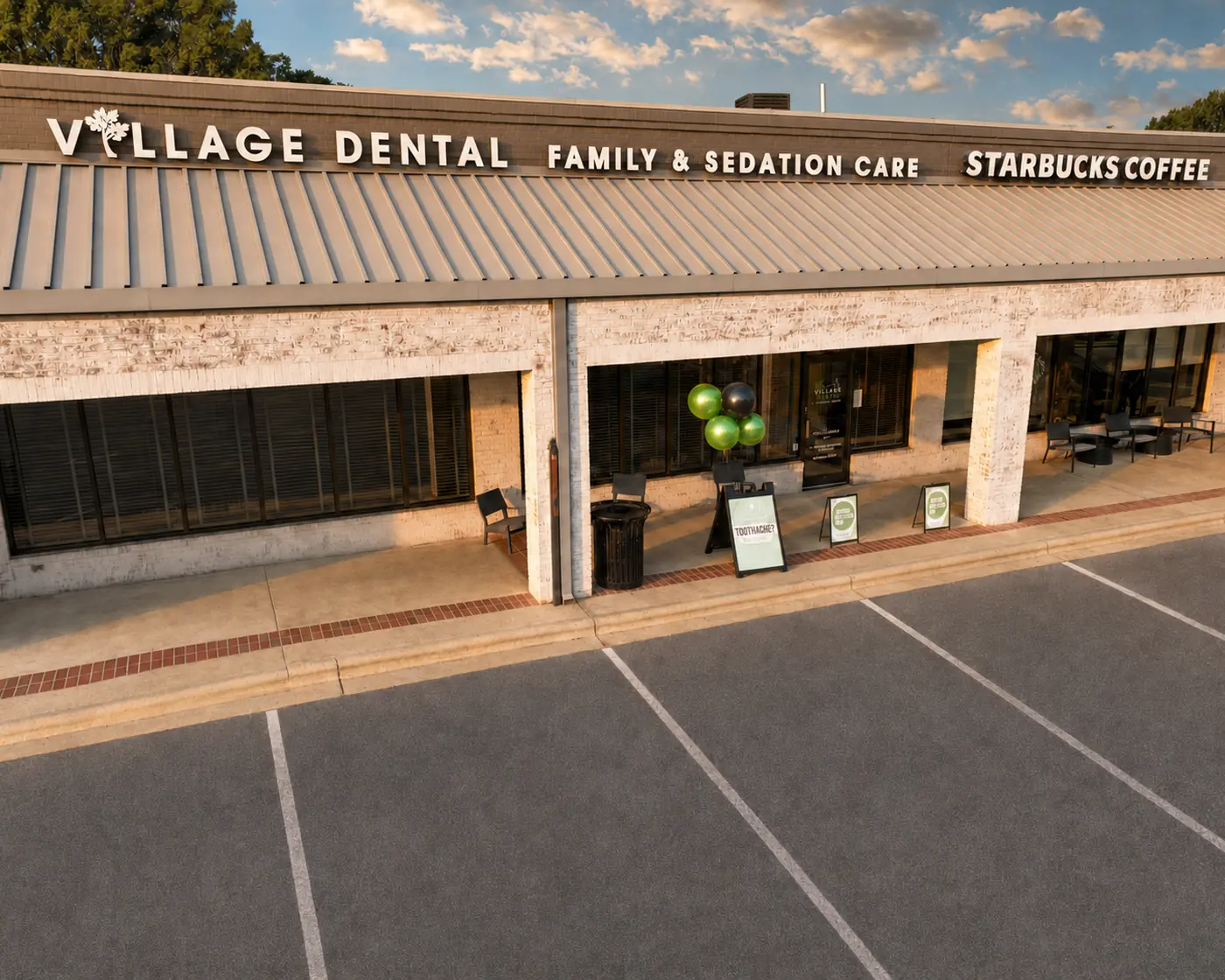 Exterior of the Village Dental — Olde Raleigh office at 3101 Edwards Mill Rd, Raleigh NC